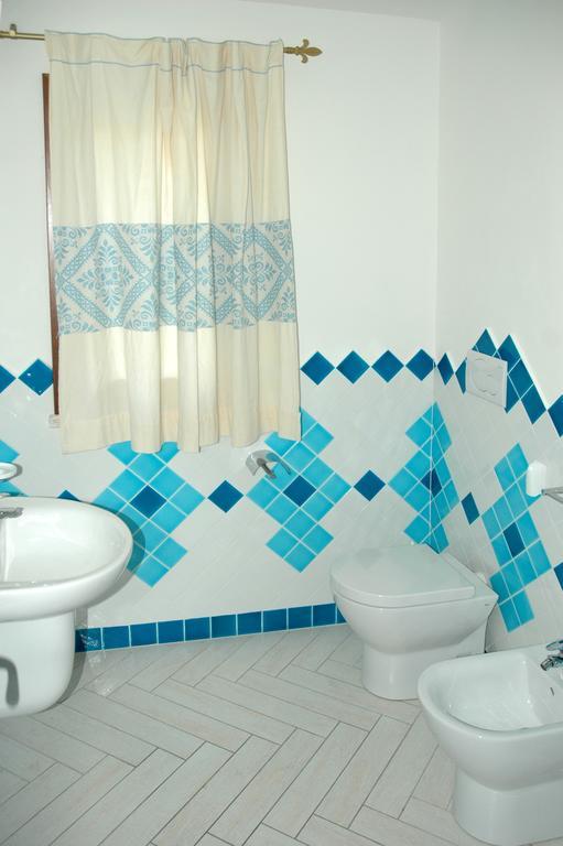 Holiday Homes Stella Marina San Teodoro  Ruang foto
