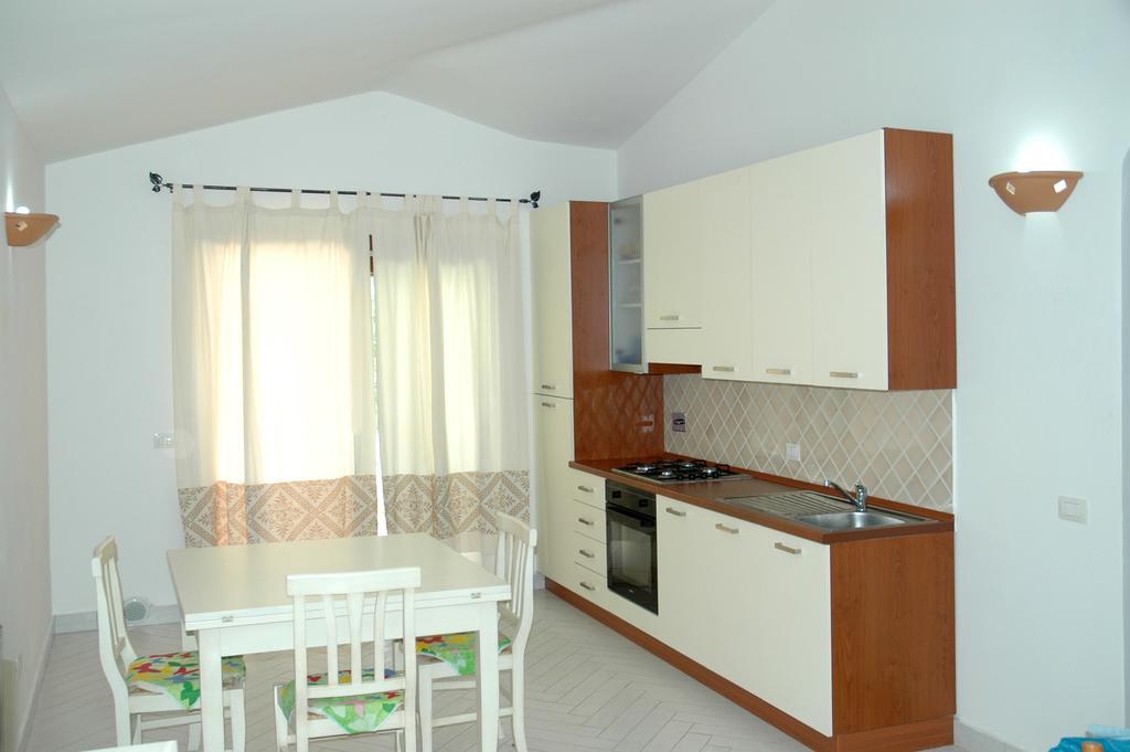 Holiday Homes Stella Marina San Teodoro  Ruang foto